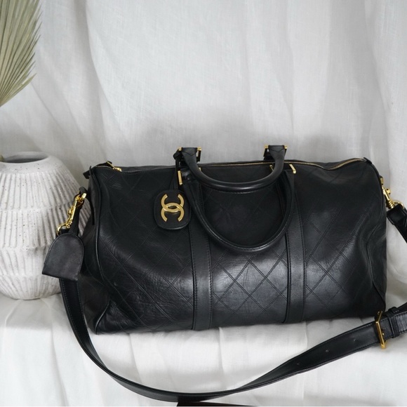 CHANEL Handbags - Chanel Black Quilted Lambskin Boston Duffle Bag